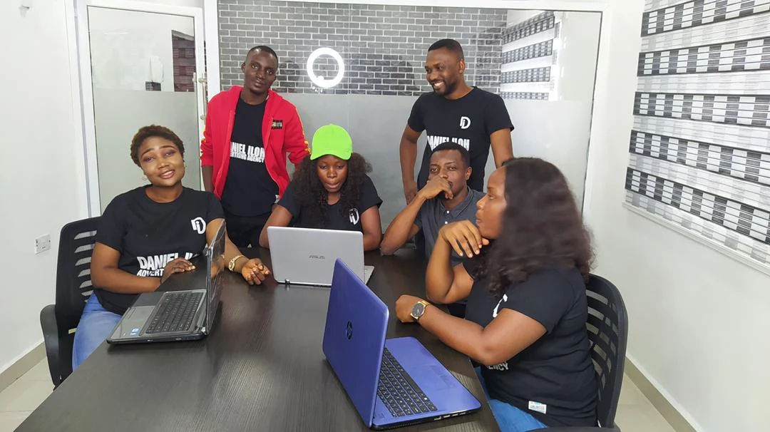 Daniel Iloh Limited team at former workspace in Nigeria