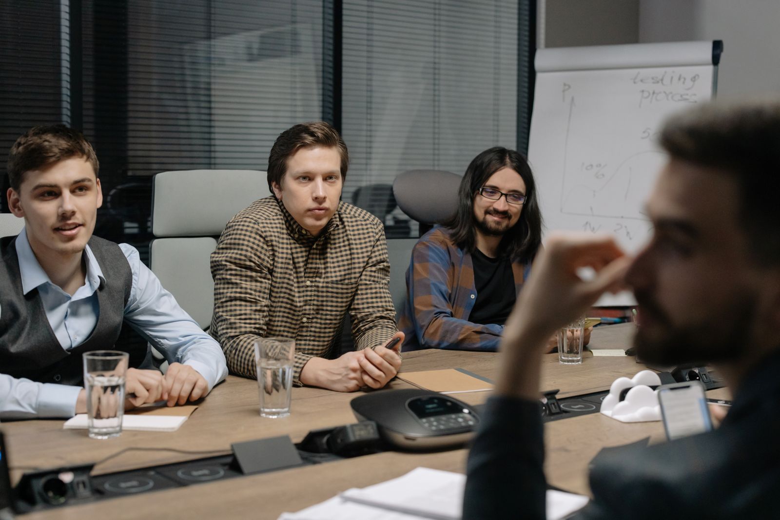 Colleagues meeting around a conference table